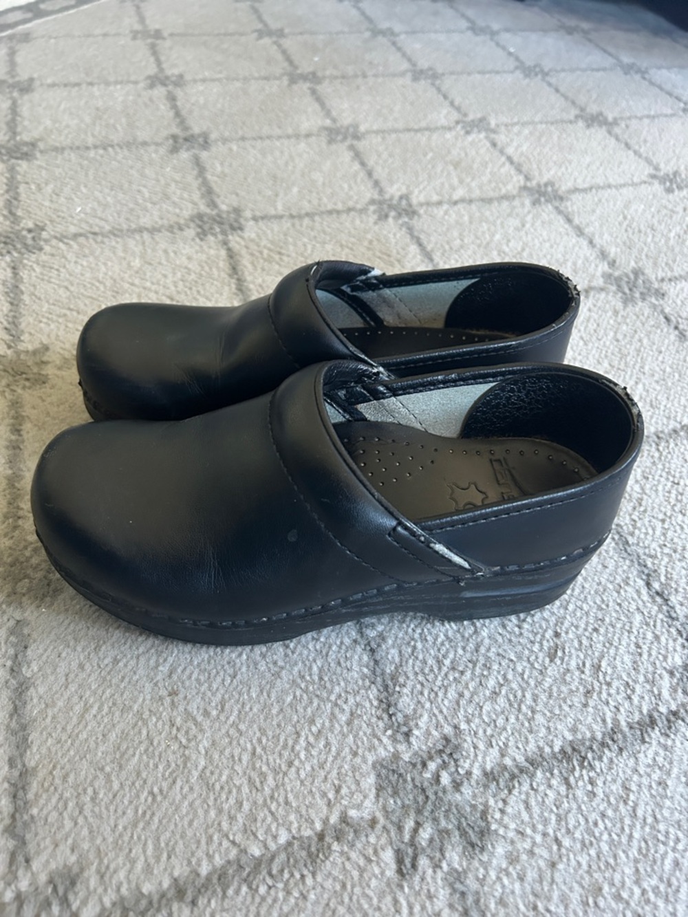 Dansko Black Leather Slip-On Clogs
